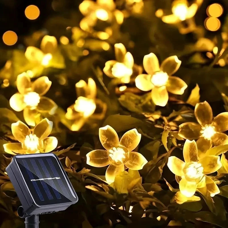 Auntie Glowria Solar Lighting 5/6.5/7/12M Purple Solar Flower String Lights | Eco-friendly Fairy LED Lights for Home Garden, Holiday Ambient Plant Lighting    ```
